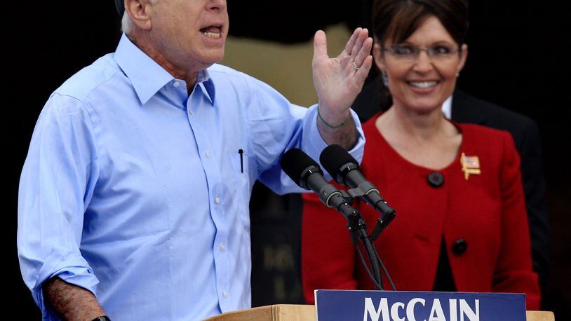Presidential candidate John McCain speaks next to running mate Sarah Palin on Broadway Avenue in downtown Lebanon on Sept. 9, 2008, in front of thousands of people outside the Golden Lamb. Staff photo by Nick Daggy