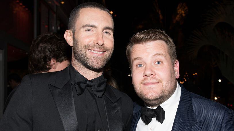Adam Levine (L) and James Corden were pulled over by a police officer during an episode of "Carpool Karaoke."  (Photo by Emma McIntyre/VF18/WireImage)