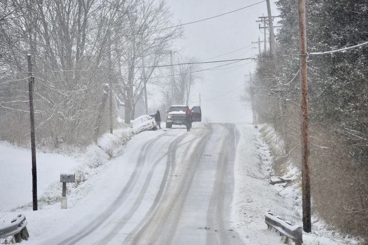 PHOTOS: Snowstorm covers region Saturday