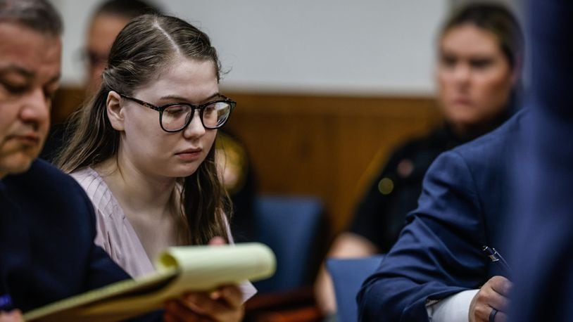 Abby Michaels, center, and her defense attorney, Jay Adams, left, at the beginning of Michaels' trial in Montgomery County Common Pleas Court on Monday, June 5, 2023. JIM NOELKER/STAFF