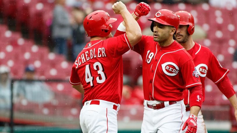 CINCINNATI, OH - SEPTEMBER 08: Joey Votto #19 of the Cincinnati Reds celebrates with Scott Schebler #43 of the Cincinnati Reds after hitting a grand slam against San Diego Padres in the second inning at Great American Ball Park on September 8, 2018 in Cincinnati, Ohio. (Photo by Justin Casterline/Getty Images)