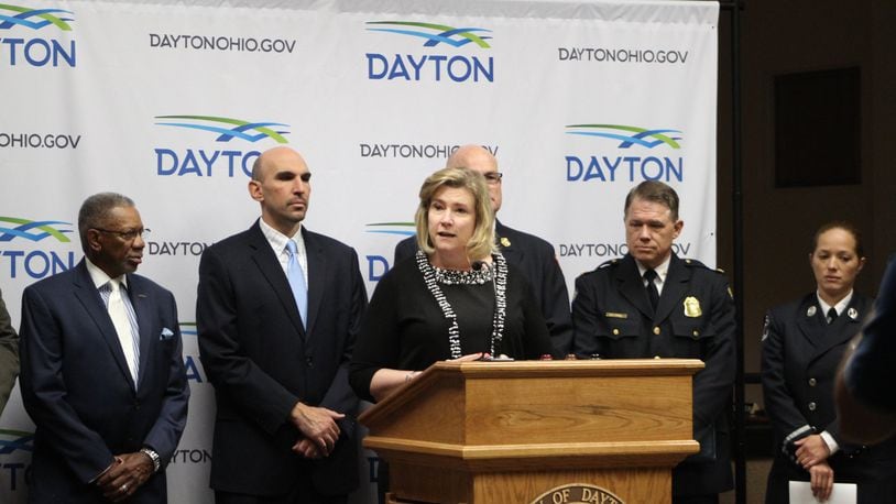 Dayton Mayor Nan Whaley announces that the city is filing a lawsuit against drug companies and distributors she says are responsible for the opioid crisis. Behind her are Commisssioners Jeff Mims Jr. and Matt Joseph and fire Chief Jeff Payne and police Chief Richard Biehl. CORNELIUS FROLIK / STAFF