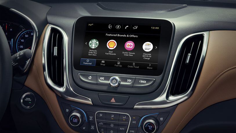GM lets customers order their morning coffee with their car, among other things, with the Marketplace app. (GM)