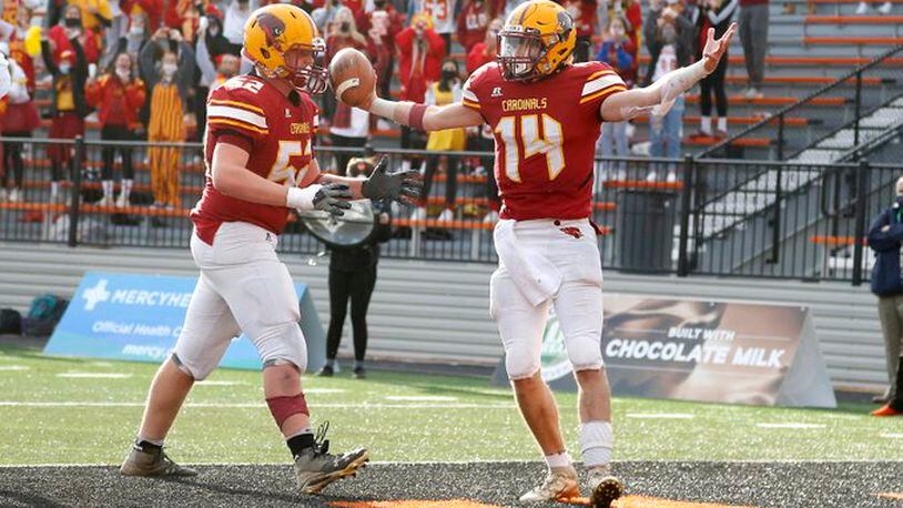 New Bremen quarterback Mitchell Hays (14) and offensive lineman Mason Kuck during Friday's Division VII state championship game at Massillon. OHSAA PHOTO