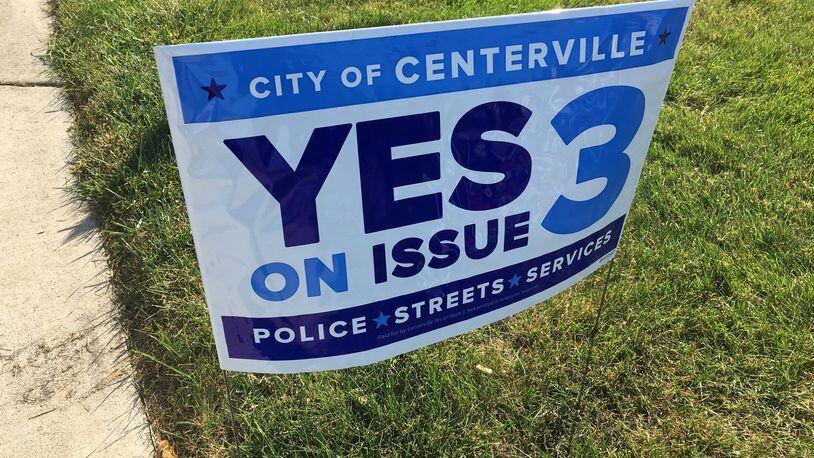 Campaign sign for Issue 3 in Centerville. Residents are being asked to approve a .5 percent earned income tax increase on the Nov. ballot. TREMAYNE HOGUE/STAFF