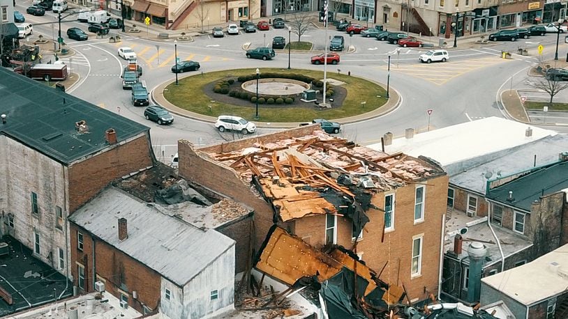 A building at N. Market and E. Main St. on Troy's downtown square lost its roof during a January 2020 EF0 tornado lasting two minutes. LISA POWELL / STAFF