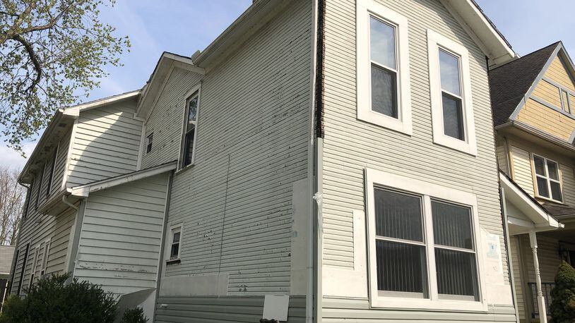 The Landmarks Commission denied a request to install vinyl siding on this home on Mound Street in the Wright Dunbar historic district. CORNELIUS FROLIK / STAFF
