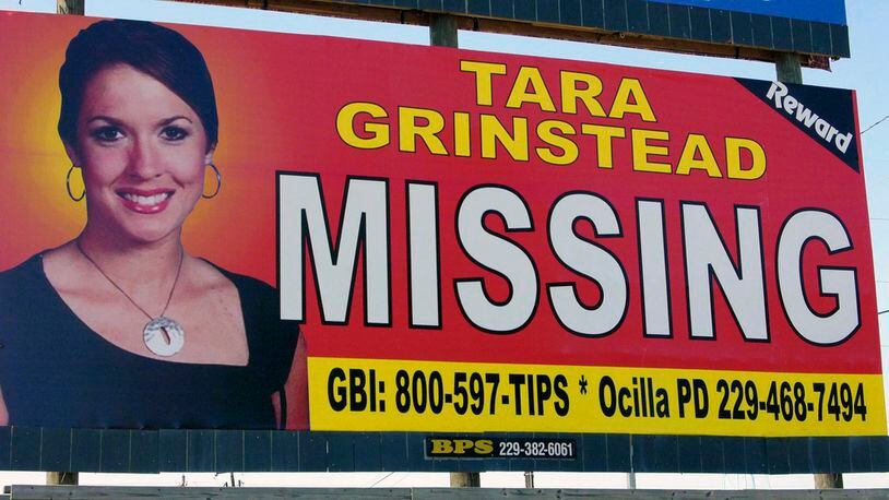 In this Oct. 4, 2006, photo, teacher Tara Grinstead is displayed on a billboard in Ocilla, Georgia. New court documents suggest that within weeks of her disappearance, two of her ex-students told friends at a party they had killed her and burned her body.
