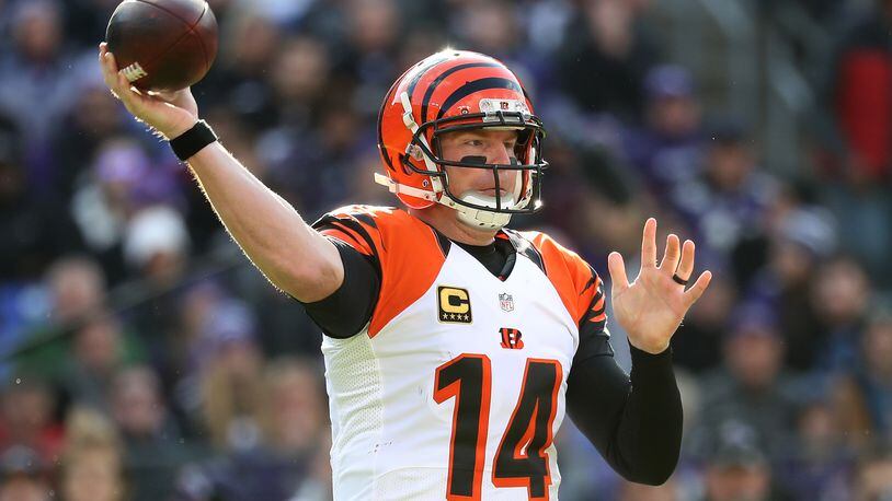 BALTIMORE, MD - NOVEMBER 27: Quarterback Andy Dalton #14 of the Cincinnati Bengals passes the ball against the Baltimore Ravens in the first quarter at M&T Bank Stadium on November 27, 2016 in Baltimore, Maryland. (Photo by Rob Carr/Getty Images)