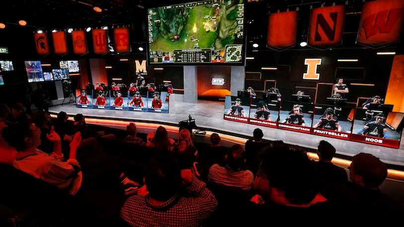 The audience watches a match between the University of Maryland, left, and the University of Illinois in the Big Ten Network "League of Legends" championship in the Battle Theater at North American League Championship Arena at Riot Games in Los Angeles on March 28, 2017.  Maryland won the best of five contest by a score of 3-0. (Mel Melcon/Los Angeles Times/TNS)