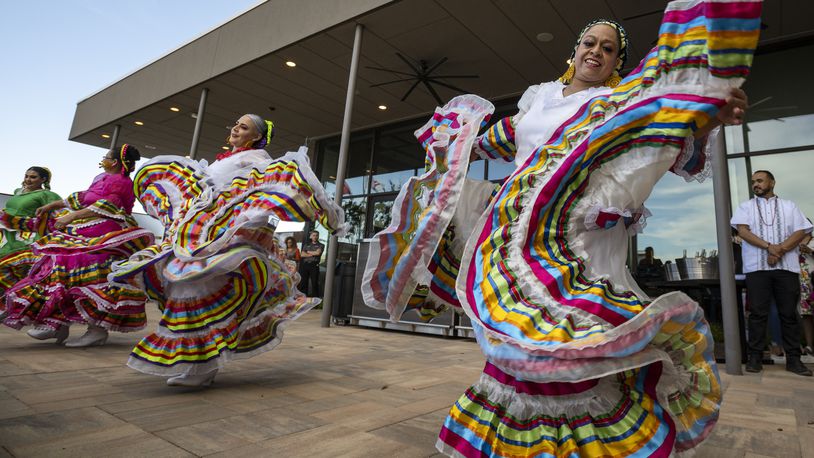 FILE - Folklorico dancers from the group Viva Mexico perform their routine during a Cinco de Mayo celebration and mixer hosted by the Odessa Hispanic Chamber of Commerce at the Odessa Marriott Hotel and Convention Center, Wednesday, May 5, 2021, in Odessa, Texas. The United States is gearing up for Cinco de Mayo. Music, all-day happy hours and deals on tacos are planned at venues across the country on May 5, 2024 in a celebration with widely misunderstood origins that is barely recognized south of the border. (Eli Hartman/Odessa American via AP, File)