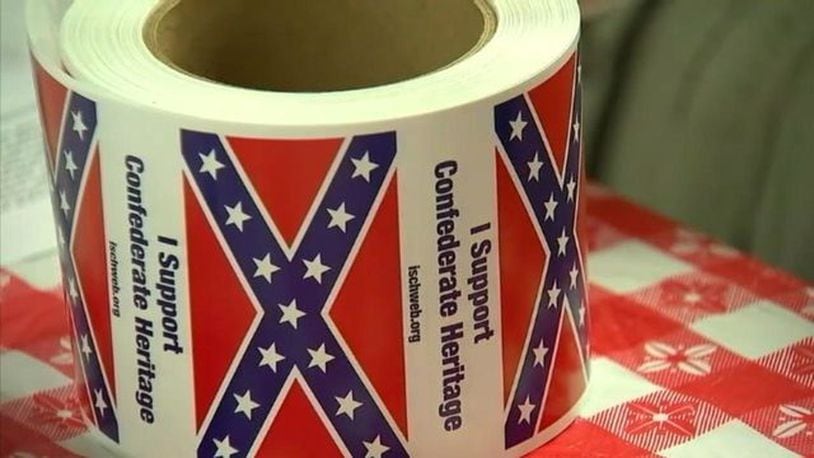 Confederate flag stickers have been given away for 25 years. (Photo: WSOCTV.com)