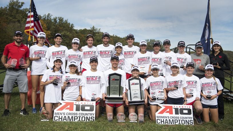 The Dayton men’s and women’s cross country teams pose for a photo after winning Atlantic 10 Conference championships in Fairfax, Va. Contributed photo by Daniel Petty