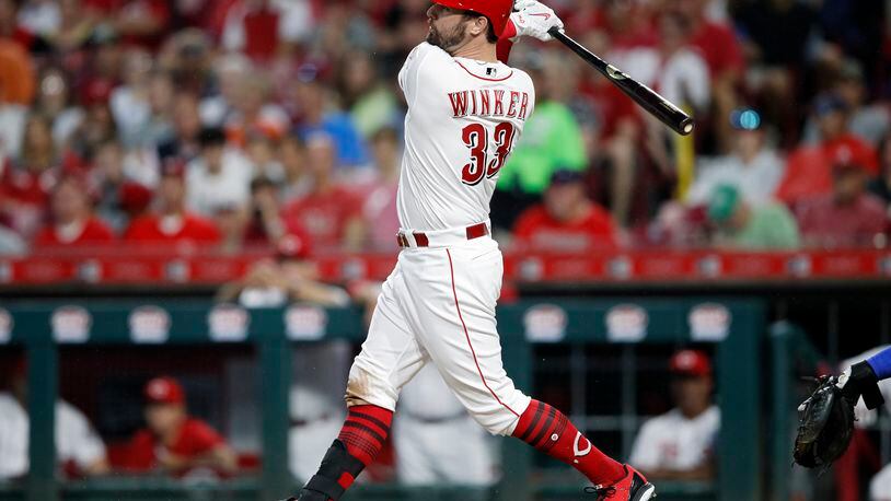 CINCINNATI, OH - JUNE 21: Jesse Winker #33 of the Cincinnati Reds hits a grand slam home run in the sixth inning to give his team the lead against the Chicago Cubs at Great American Ball Park on June 21, 2018 in Cincinnati, Ohio. (Photo by Joe Robbins/Getty Images)