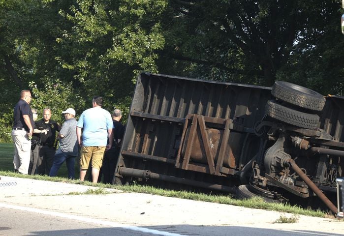 One killed after Northwestern school bus overturns in crash