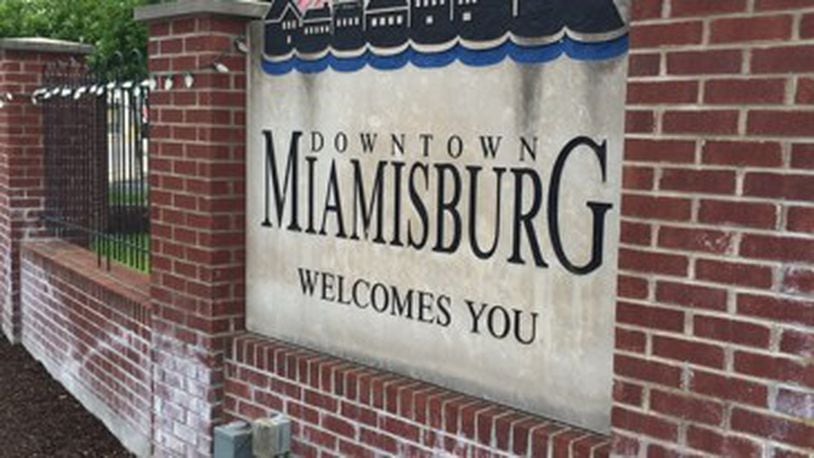 Four candidates are vying for three Miamisburg City Council at-large seats today in a race that includes two incumbents and a pair of challengers.