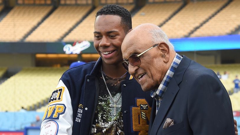 Hunter Greene meets Hall of Famer Don Newcombe during batting practice before a game against the Philadelphia Phillies at Dodger Stadium on April 28, 2017 in Los Angeles, California. (Photo by Jayne Kamin-Oncea/Getty Images)