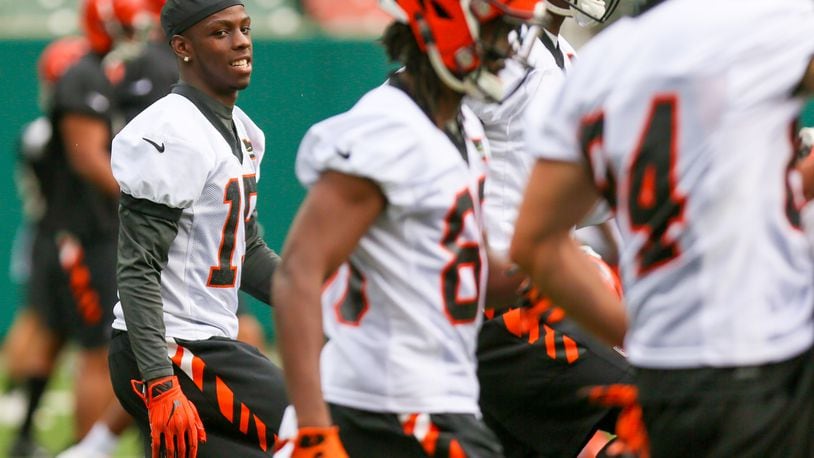 Bengals wide receiver John Ross (15) goes through stetching at minicamp practice at Paul Brown Stadium, Tuesday, June 13, 2017. GREG LYNCH / STAFF