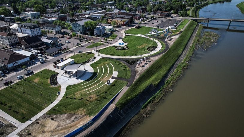 Miamisburg's Riverfront Park is a $5.5 million revamp featuring a 7,600-square-foot playground and an amphitheater. A grand opening celebration for the 7.5-acre park is scheduled for Friday, May 10. JIM NOELKER/STAFF