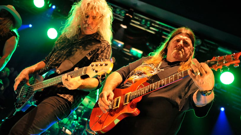Guitarist Dave Hlubek (R) and bassist Tim Lindsey of American hard rock group Molly Hatchet performing live on stage at Hard Rock Hell VI : A Fistful Of Rock, on November 30, 2012. (Photo by Kevin Nixon/Metal Hammer Magazine/Future Publishing via Getty Images)