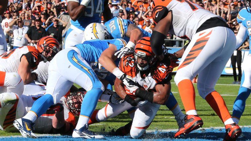 SAN DIEGO, CA - DECEMBER 01: Running back Benjarvis Green-Ellis #42 of the Cincinnati Bengals scores on a four yard touchdown carry against the San Diego Chargers at Qualcomm Stadium on December 1, 2013 in San Diego, California. (Photo by Stephen Dunn/Getty Images)