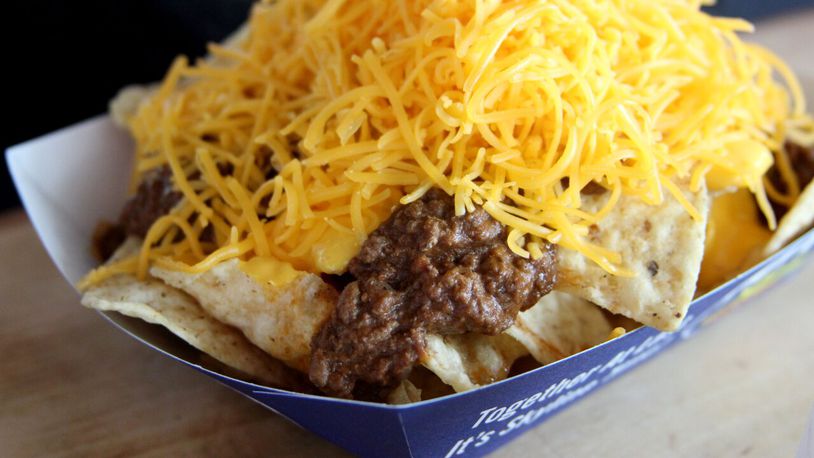 The Skyline Chili Nachos features tortilla chips topped with Skyline chili, nacho cheese sauce and shredded cheddar cheese. It's available at the Skyline locations at Sections 115 and 418. WCPO/FELICIA JORDAN