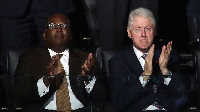 PHILADELPHIA, PA - JULY 25: Former U.S. President Bill Clinton (R) claps during first lady Michelle Obama's speech on the first day of the Democratic National Convention at the Wells Fargo Center, July 25, 2016 in Philadelphia, Pennsylvania. An estimated 50,000 people are expected in Philadelphia, including hundreds of protesters and members of the media. The four-day Democratic National Convention kicked off July 25. (Photo by Win McNamee/Getty Images)