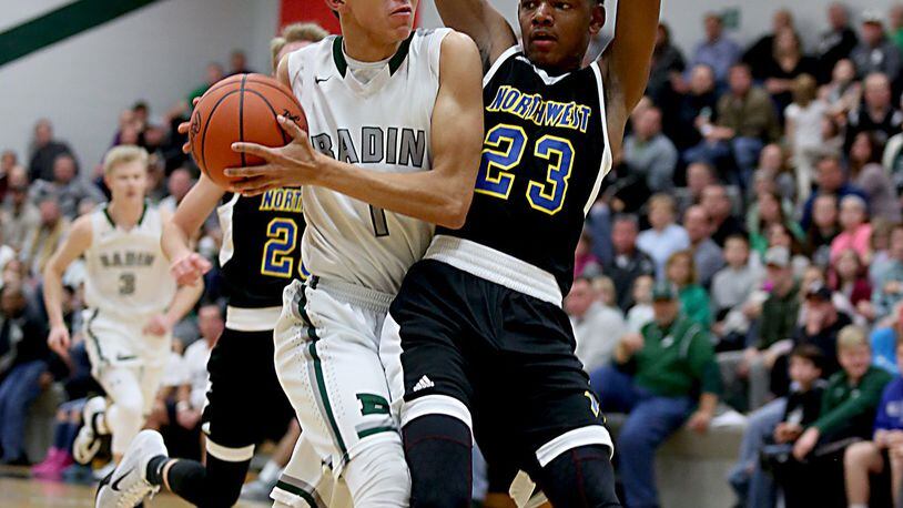 Badin wing Caleb Meyer is covered by Northwest guard Tyree McKinney during their game at Mulcahey Gym in Hamilton on Wednesday night. CONTRIBUTED PHOTO BY E.L. HUBBARD