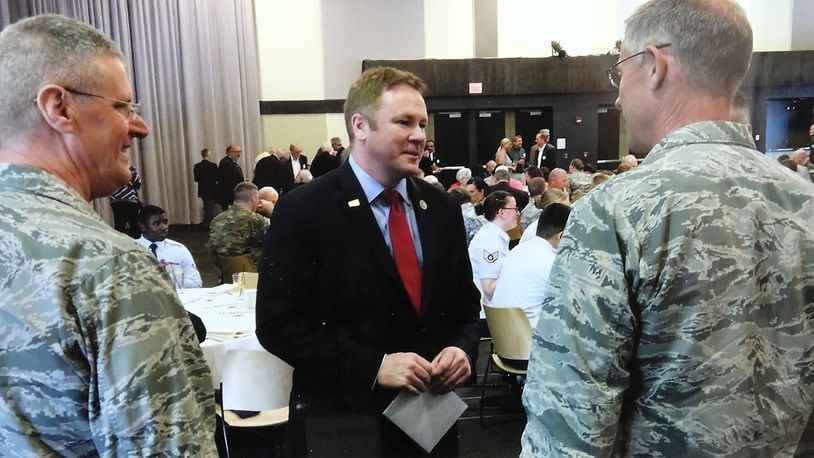 FILE: U.S. Rep. Warren Davidson’s talks to National Guard officials before the annual Military Appreciation Luncheon on Monday. Bill Lackey/Staff