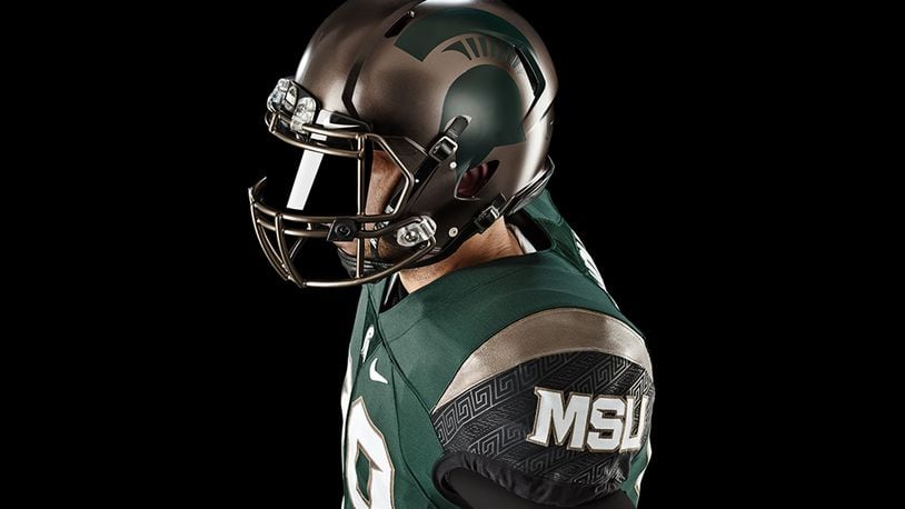 Influenced by Spartan shields, the new Michigan State uniform incorporates bronze fixtures - including on the helmet - throughout the design.