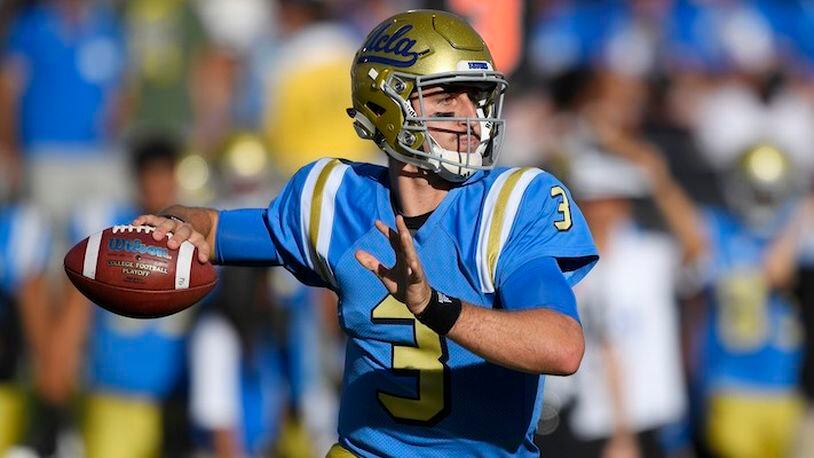 FILE - In this Sept. 10, 2016, file photo, UCLA quarterback Josh Rosen passes during the first half of a college football game against UNLV in Pasadena, Calif. The touted passer missed half of his sophomore season with injuries. With Jedd Fisch becoming his third offensive coordinator in three years, he could swiftly return his NFL draft stock to its former heights. (AP Photo/Mark J. Terrill, File)