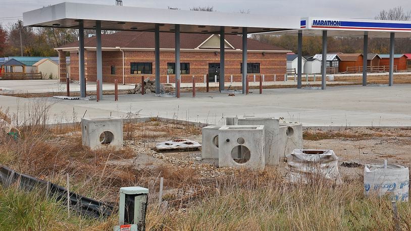 The Marathon gas station at the intersection of U.S. 40 and Ohio 235 in Clark County has been partially completed for over a year. BILL LACKEY/STAFF