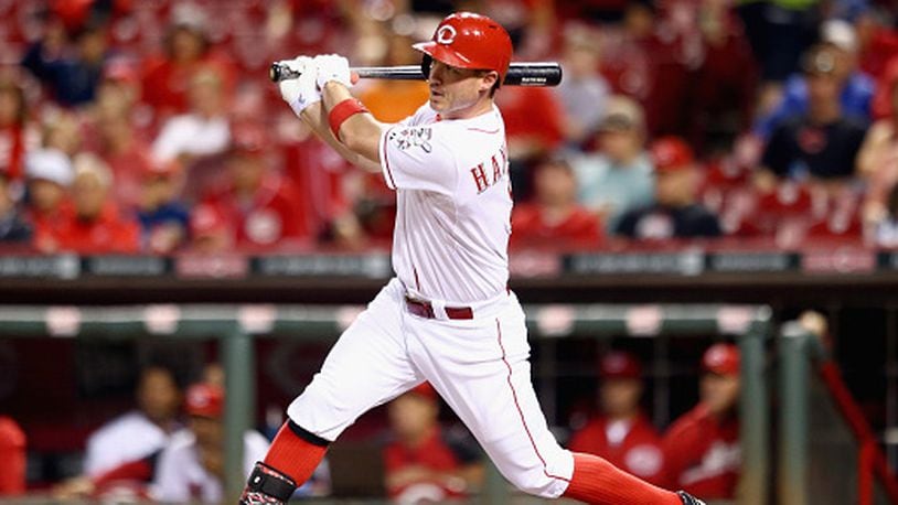 CINCINNATI, OH - SEPTEMBER 24: Jack Hannahan #9 of the Cincinnati Reds hits a single in the third inning during the game against the Milwaukee Brewers at Great American Ball Park on September 24, 2014 in Cincinnati, Ohio. (Photo by Andy Lyons/Getty Images)