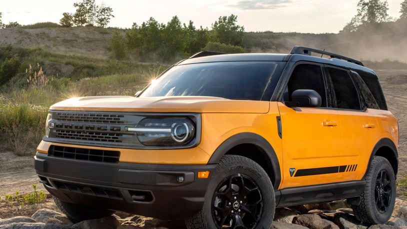 The all-new Bronco Sport First Edition series in Cyber Orange Metallic Tri-Coat. (Pre-production model pictured.)  Ford Motor Co. photo
