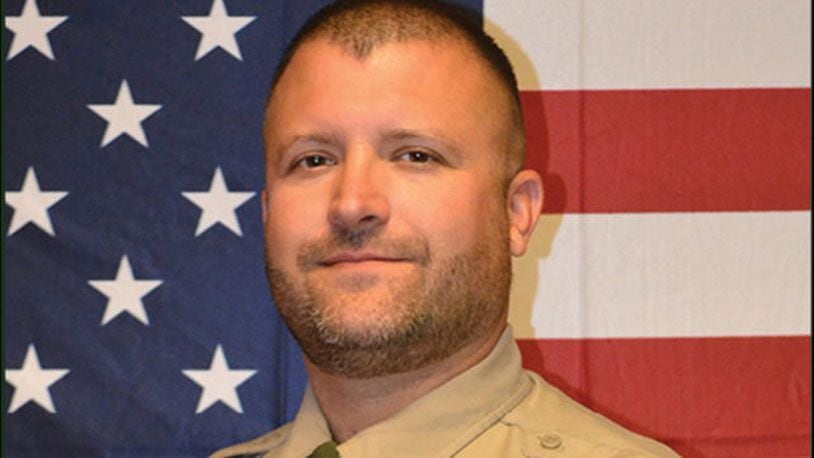 Authorities in Kittitas County identified a sheriff's deputy shot and killed on Tuesday, March 19, 2019, as Deputy Ryan Thompson, 42.