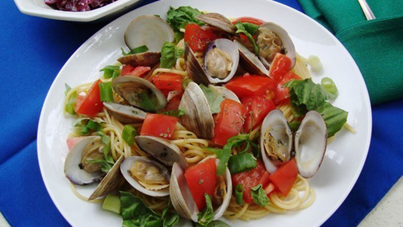Spaghettini with clams and herb sauce. (Linda Gassenheimer/TNS)