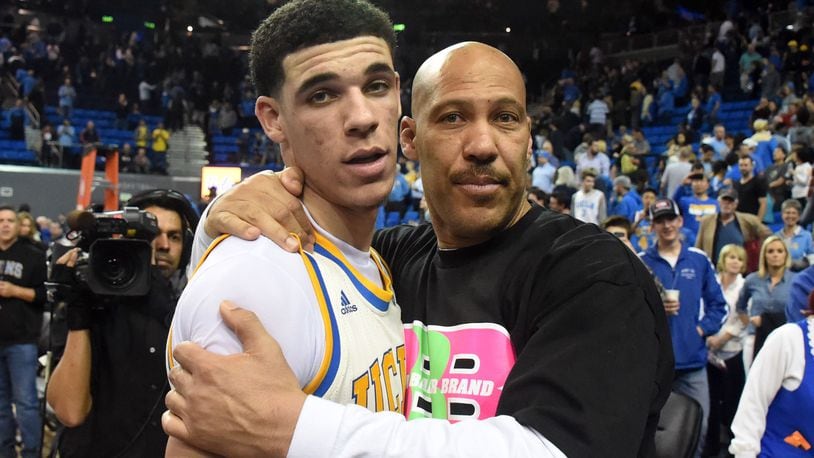 LaVar Ball, right, embraces his son, Lonzo, after a recent UCLA game at Pauley Pavilion.