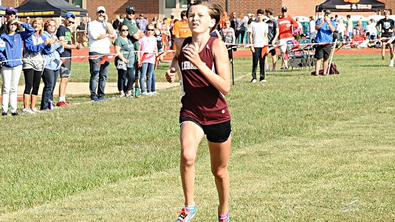 Faith Duncan’s victory in 17 minutes, 51.6 seconds won the girls Division I-II big school division at Saturday’s Bob Schul Invitational and helped Lebanon win the team title. GREG BILLING / CONTRIBUTED
