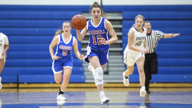 Carroll's Ava Lickliter brings the ball upcourt against Valley View during Tuesday's Division II regional semifinal at Springfield. Michael Cooper/CONTRIBUTED