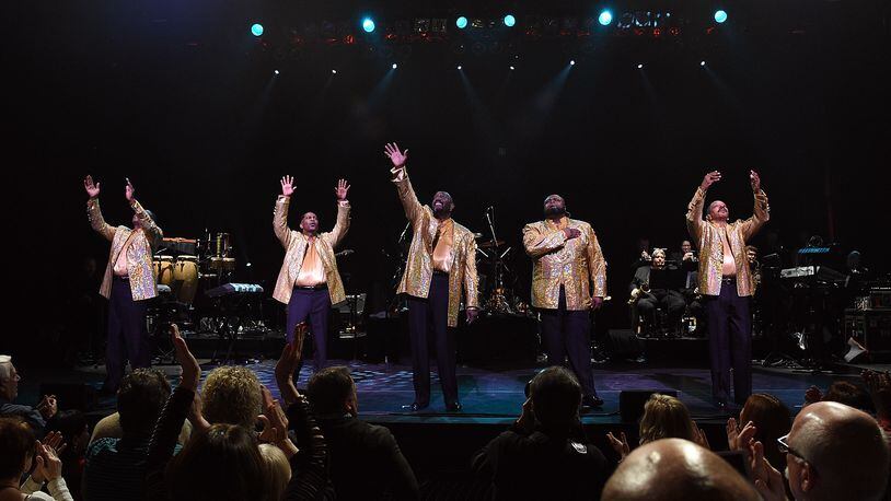 NEW YORK, NY - DECEMBER 29:  (L-R) Members of The Temptations, Joe Herndon, Terry Weeks, Otis Williams, Bruce Williamson and Ronald Tyson take their curtain call bow at "The Temptations and The Four Tops on Broadway" at Palace Theatre on December 29, 2014 in New York City.  (Photo by Andrew H. Walker/Getty Images)