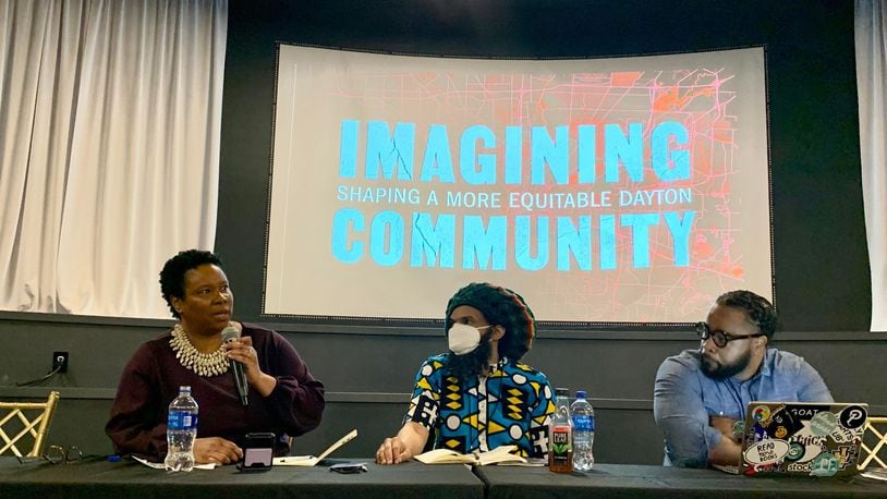 On the first day of the Imagining Community Symposium, Sinclair Community College professors (from left to right) Furaha Henry-Jones, Faheem Curtis-Khidr and Amaha Sellassie discuss how to shape a more equitable Dayton.