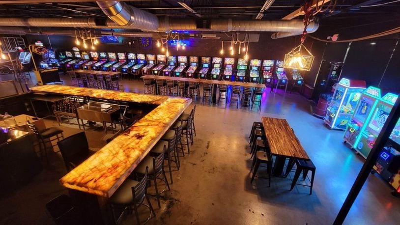 Wild Axe Throwing in Beavercreek has completed its expansion next door with the opening of Level Up Pinball Bar. CONTRIBUTED PHOTO