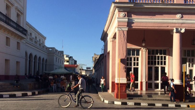 A man cycles down a street in Santa Clara, Cuba. (Amelia Rayno/Minneapolis Star Tribune/TNS)