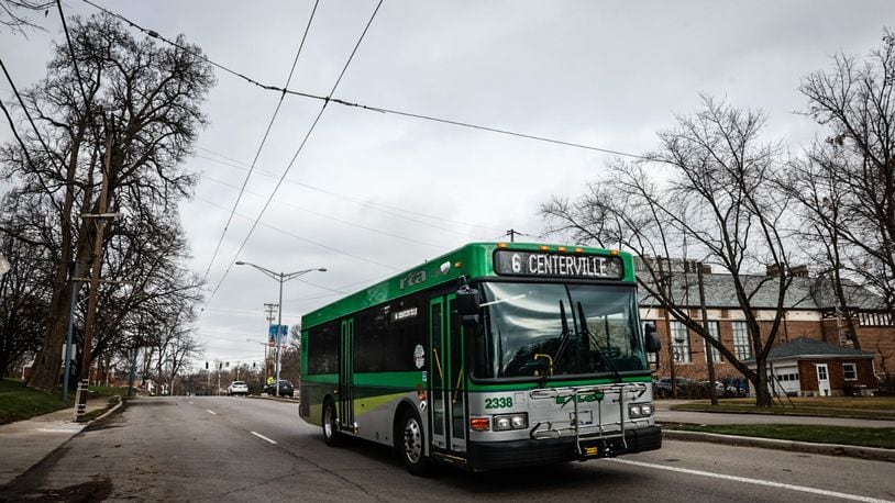 An RTA bus travels south on Far Hills Avenue in Oakwood on Monday Jan. 8, 2024. The Greater Dayton Regional Transit Authority will be removing the overhead trolley wire system for the older-style buses throughout the city of Oakwood. JIM NOELKER/STAFF