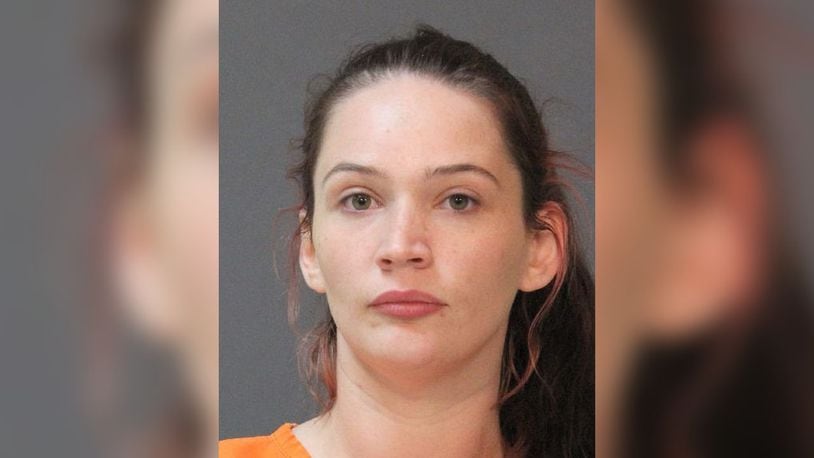 Sarah Parker, was arrested by the Calcasieu Parish Sheriff's Office when the body of the wife of Logan Kyle, her alleged Army soldier boyfriend, was in the trunk of a car.