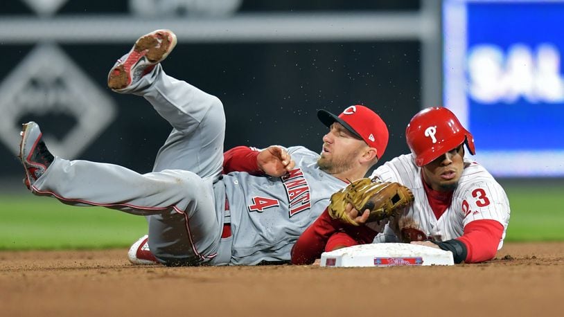 PHILADELPHIA, PA - APRIL 11: Aaron Altherr #23 of the Philadelphia Phillies gets picked off at second base by Cliff Pennington #4 of the Cincinnati Reds in the 10th inning at Citizens Bank Park on April 11, 2018 in Philadelphia, Pennsylvania. The Phillies won 4-3. (Photo by Drew Hallowell/Getty Images)