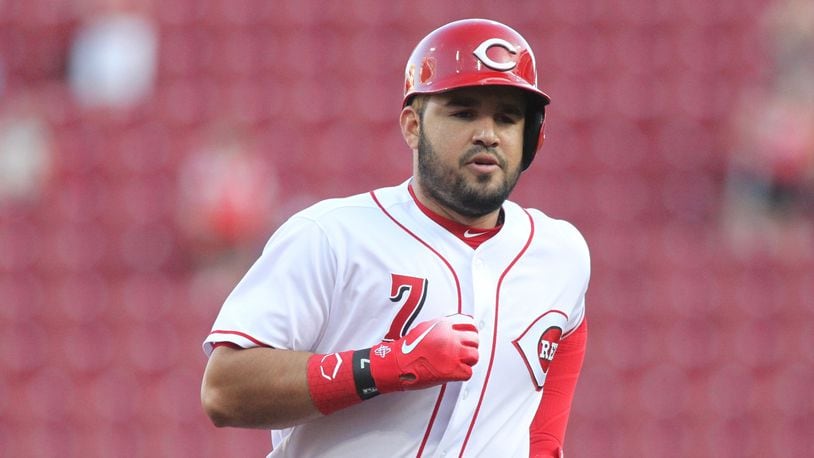 The Reds’ Eugenio Suarez rounds the bases after a home run against the Brewers on Tuesday, May 1, 2018, at Great American Ball Park in Cincinnati. David Jablonski/Staff