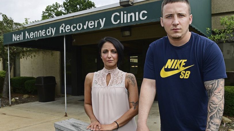 Niki Campana, left, and Paul Wright stand together outside the Neil Kennedy Recovery Clinic, Thursday, June 15, 2017, in Youngstown, Ohio. Republican efforts to roll back âObamacareâ are colliding with the opioid epidemic. Cutbacks would hit hard in states that are deeply affected by the addiction crisis and struggling to turn the corner. The issue is Medicaid, expanded under former President Barack Obama. Data show that Medicaid expansion is paying for a large share of treatment costs in hard hit states. (AP Photo/David Dermer)
