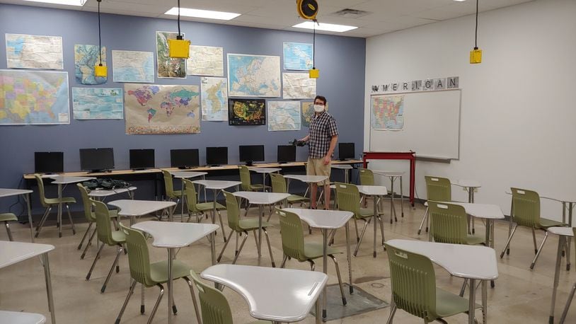 Dayton Regional STEM School social studies teacher Nick Pant prepares in his classroom for the new school year. CONTRIBUTED
