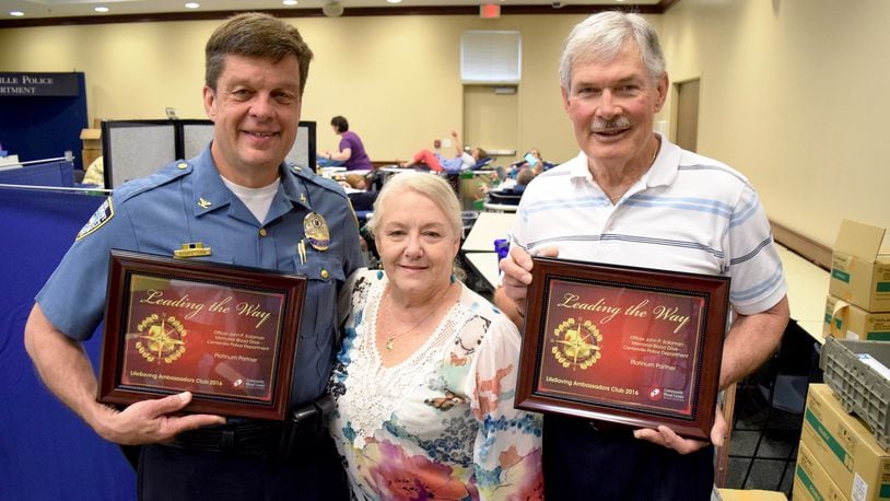 Paula and John Kalaman with retired Centerville Police Chief Bruce Robertson at 2017 Officer John P. Kalaman Memorial Blood Drive. CONTRIBUTED